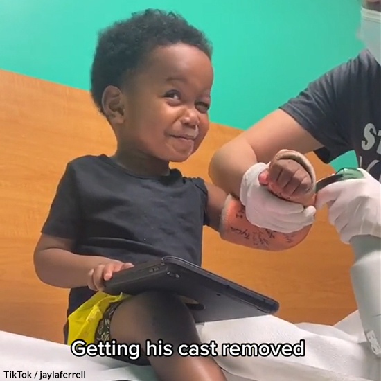 Boy Gets Cast Off with iPad by His Side